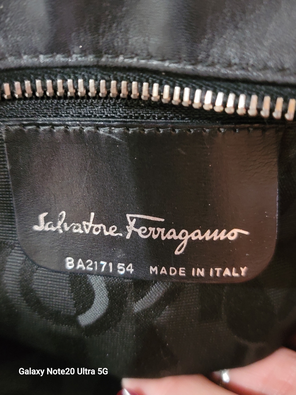 Salvatore Ferragamo Black Leather Bag with Silver Disc Charm